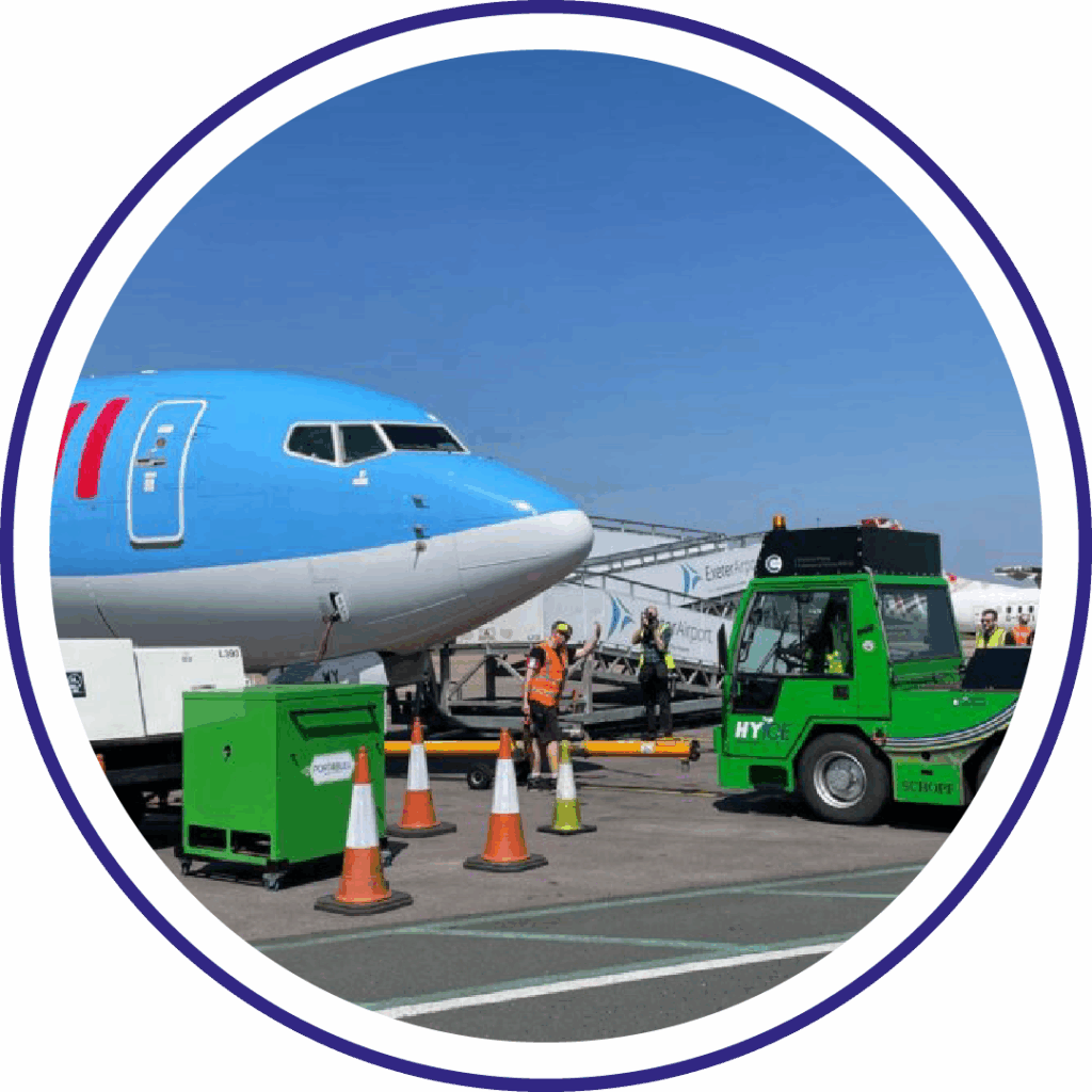 ULEMCo hydrogen-powered aircraft tow tug operating at an airport